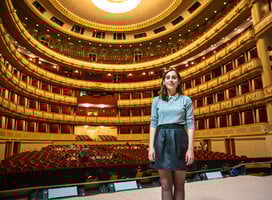 An IES Abroad Vienna student standing in one of Vienna's famous Opera Houses
